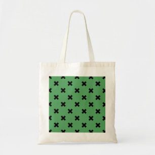 Black cross stitches on green tote bag