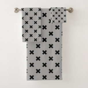 Black cross stitches on grey bath towel set