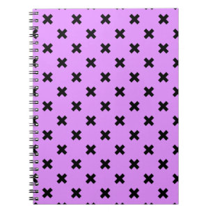 Black cross stitches on lilac notebook
