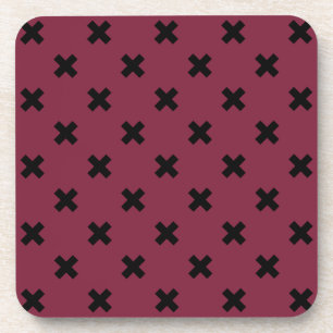 Black cross stitches on mulberry coaster