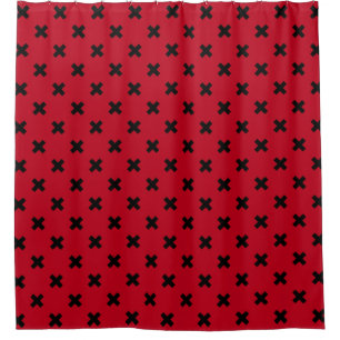 Black cross stitches on red shower curtain