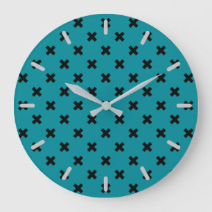 Black cross stitches on teal large clock