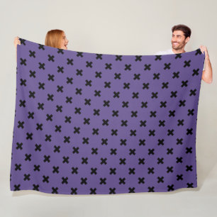 Black cross stitches on ultra violet fleece blanket