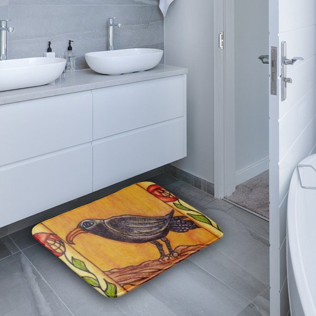 Black Crow Art Deco Roses Folk Art Bath Mat (Black crow on branch with red flowers on stem on golden yellow bath rug.)