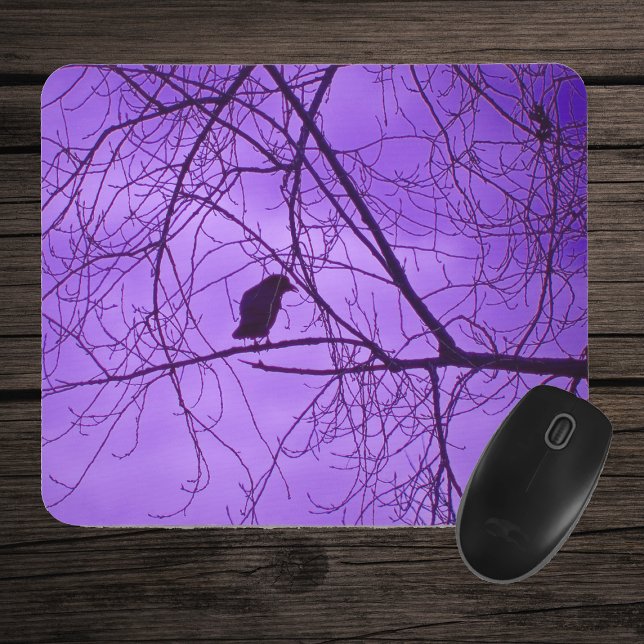 Black Crow Barren Tree Branches Purple Sky Mouse Pad (Single black crow in barren black trees against purple sky on mousepad.)