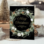 Black Elegant Pine Greenery | Gold Merry Christmas Holiday Card<br><div class="desc">This stunning folded holiday card features a Christmas wreath with elegant botanical greenery foliage,  and pine cones with festive white flowers on a dark black background. Modern faux gold script calligraphy says "Merry Christmas." The inside of the card has a place to add a personal message.</div>