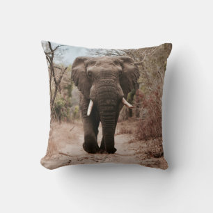 BLACK ELEPHANT WALKING ON BROWN SAND CUSHION