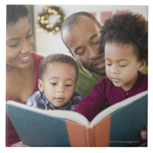 Black family reading book together ceramic tile