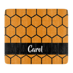 Black fence on orange cutting board