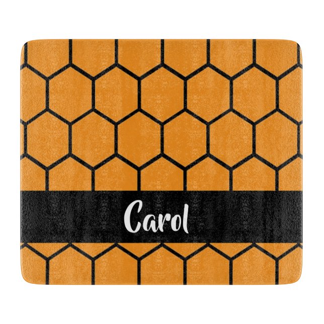 Black fence on orange cutting board (Front)