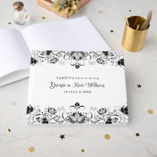 Black floral border on white guest book