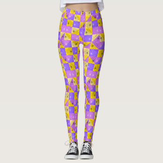 black flowers on pink purple and gold abstract leggings