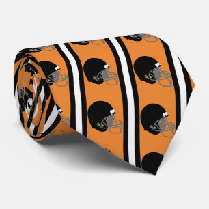 Black Football Helmet on Burnt Orange Necktie