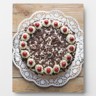 Black Forest cake on rustic wood Plaque