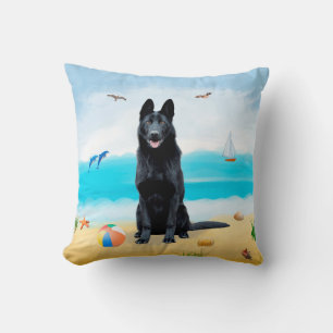 Black German Shepherd Dog on Beach Cushion