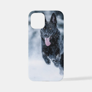 Black German Shepherd in snow Duvet Cover