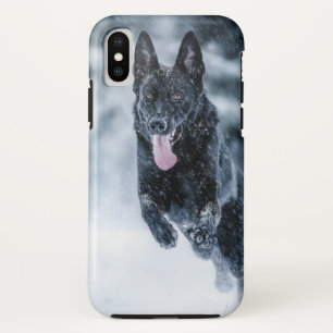 Black German Shepherd in snow Duvet Cover