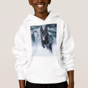 Black German Shepherd in snow Duvet Cover