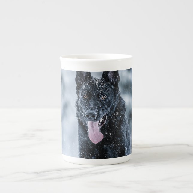 Black German Shepherd in snow Duvet Cover Bone China Mug (Front)