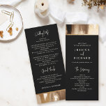 Black & Gold Abstract Watercolor Wedding Program<br><div class="desc">Guide your guests with grace using our wedding program card. Chic minimalist typography shines against a dark watercolor canvas adorned with faux gold accents. The black overlay gracefully displays your wedding program details on both sides.</div>