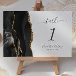 Black Gold Agate Wedding Table Number<br><div class="desc">The left-hand edge of this elegant modern wedding table number card features a black watercolor agate border trimmed with faux gold glitter. The customizable text combines charcoal gray handwriting,  and italic and copperplate fonts on a white background.</div>
