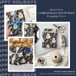 Black & Gold Christmas Snowman Wrapping Paper<br><div class="desc">Wrap their gifts in holiday magic with our luxurious Black & Gold Christmas Snowman Wrapping Paper. • Available in 5 sizes from 6 to 60 feet • Printed on premium quality paper in the USA • Showcases a stunning snowman design in rich black and gold tones This premium wrapping paper...</div>