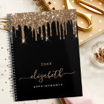 Black gold glitter drips monogram name 2024 planner<br><div class="desc">An elegant black background with faux gold glitter drips, paint dripping look. Personalise and add a year, name and a title. The name is written with a golden large modern hand lettered style script. Perfect for school, work or organising your personal/family life. To keep the swashes only delete the sample...</div>