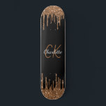 Black gold glitter drips monogram script elegant skateboard<br><div class="desc">A classic black background with faux dark gold glitter drips,  paint dripping look. Personalise and add a name and monogram initials. The name is written with a modern hand lettered style script. White and golden letters.</div>