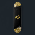 Black Gold Glitter Girly Monogram Skateboard<br><div class="desc">Black and Gold Glitter Personalised Skateboard with two custom-printed monogram initials customisation with a bold faux sparkle printed artwork with glittery bling perfect as a wall decoration,  keepsake,  or girly design skateboard to use at the park.</div>