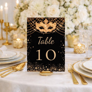 Black gold masquerade glitter table number