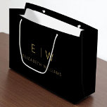 Black Gold Modern Minimalist Monogram Name Large Gift Bag<br><div class="desc">Present your gifts in style with our Black and White Modern Minimalist Monogram Name Gift Bag. This elegant bag boasts a clean and contemporary design, featuring a customisable monogram that adds a personalised touch to your gift-giving. Crafted with quality in mind, this bag is both sophisticated and minimalist, making it...</div>