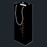 Black Gold Modern Script Girly Monogram Name Wine Gift Bag<br><div class="desc">Black and Gold Simple Script Monogram Name Gift Bag. This makes the perfect sweet 16 birthday,  wedding,  bridal shower,  anniversary,  baby shower or bachelorette party gift bag for someone that loves glam luxury and chic styles.</div>
