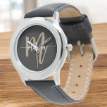 Black Gold Modern Script Monogram Name Watch<br><div class="desc">Elevate your style with the Black and Gold Modern Script Monogram Name Watch. Featuring a sleek black face and bold gold monogram in a modern script font, this watch combines luxury and timeless elegance. The high-quality craftsmanship ensures both durability and precision, while the custom monogram adds a personalised touch that...</div>