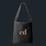Black gold monogram initials elegant modern crossbody bag<br><div class="desc">A classic chic black background. Personalise and add your monogram initials written with golden block letters. Modern,  trendy and simple.</div>