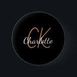 Black gold monogram initials name minimalist 6 cm round badge<br><div class="desc">Black background,  golden and white text. Personalise and add your monogram initials and name.  The name is written with a mothern hand lettered style script.</div>