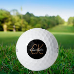 Black gold monogram initials name minimalist  golf balls<br><div class="desc">Black background,  golden and white text. Personalise and add your monogram initials and name.  For both him and her.  The name is written with a modern hand lettered style script.</div>