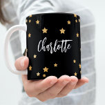 Black gold stars name elegant coffee mug<br><div class="desc">A black background decorated with golden stars. Personalise and add your name. The name is written with a modern hand lettered style script .</div>