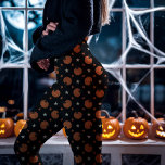 Black Halloween Pumpkins and Stars Leggings<br><div class="desc">Get into the Halloween spirit with these Black Halloween Pumpkins and Stars Leggings. Featuring vibrant orange pumpkins and whimsical stars on a deep black background, these leggings bring a festive and vintage Halloween charm to your wardrobe. Perfect for Halloween parties, casual outings, or spooky season lounging, these leggings combine comfort...</div>