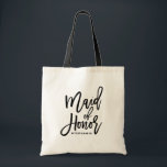 Black Hand Lettering Maid of Honour Custom Tote Ba<br><div class="desc">Modern and classic tote bag featuring black MAID OF HONOR hand lettering script. Personalise by adding the receivers name or the hashtag of the wedding. Perfect as a gift for your wedding party or bridal party.</div>
