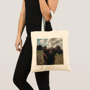 Black highland Scottish cow grazing vintage retro Tote Bag
