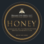 Black Honey Label with Metallic gold Vintage bee<br><div class="desc">Your apiary name looks amazing in a classy white decorative font that is artfully reflected in dark gold on a black background. Contact info, address and honey net weight is written in the lower part of label under the word "HONEY" which takes centre field in a chiseled gold metallic font....</div>