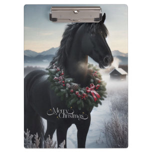 Black horse in the snow with Christmas wreath Clipboard