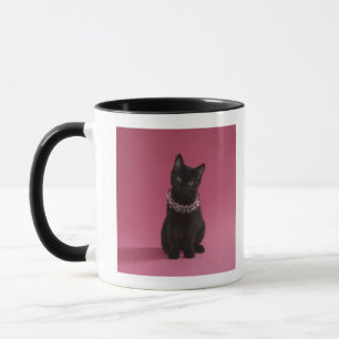 Black kitten wearing jewelled necklace mug