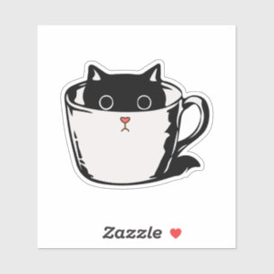 Black kitten with red nose hiding in a cup