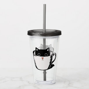 Black kitten with red nose hiding in a cup