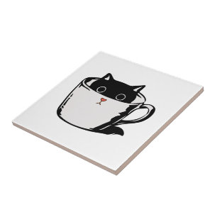 Black kitten with red nose hiding in a cup ceramic tile