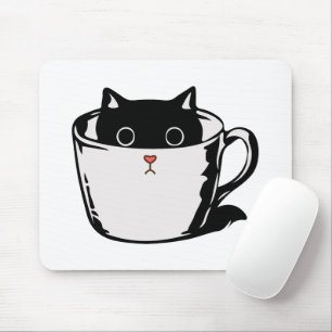 Black kitten with red nose hiding in a cup mouse pad