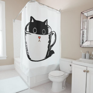 Black kitten with red nose hiding in a cup shower curtain