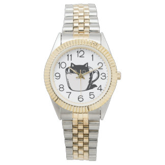 Black kitten with red nose hiding in a cup watch