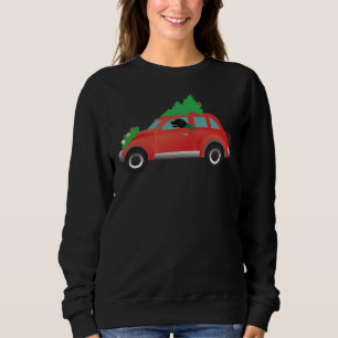 Black Lab Driving Red Christmas Car With Tree On T Sweatshirt